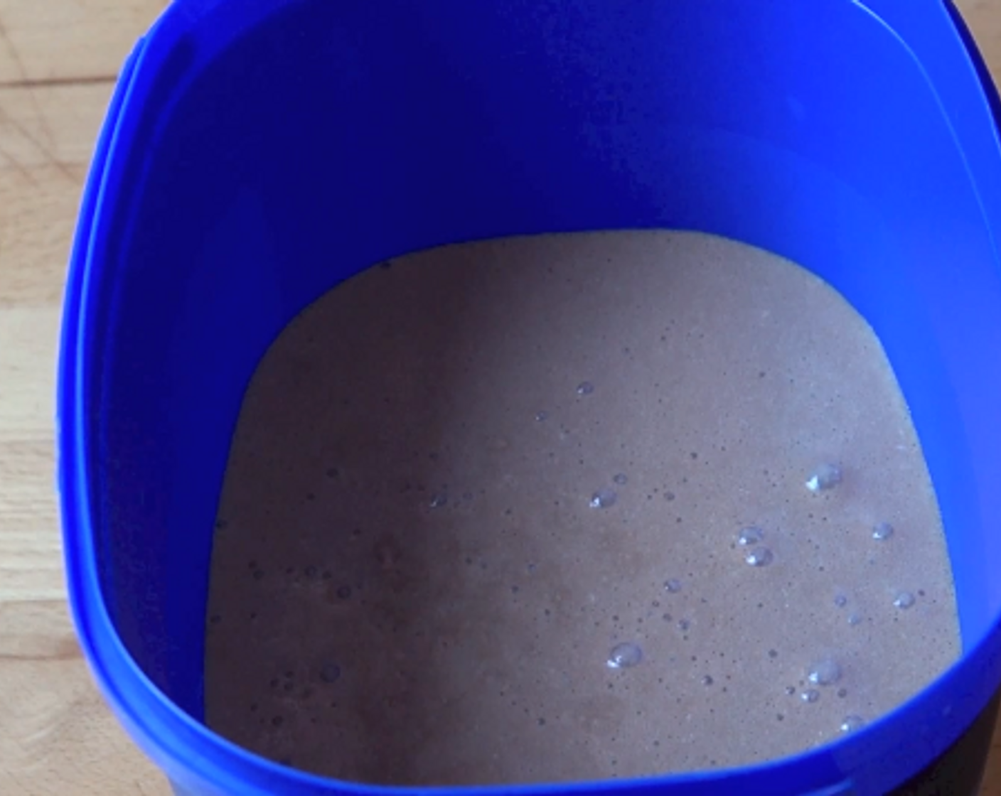 step 4 Pour the mixture into an old ice cream tub, place the lid on and allow it to freeze for 6 to 8 hours.