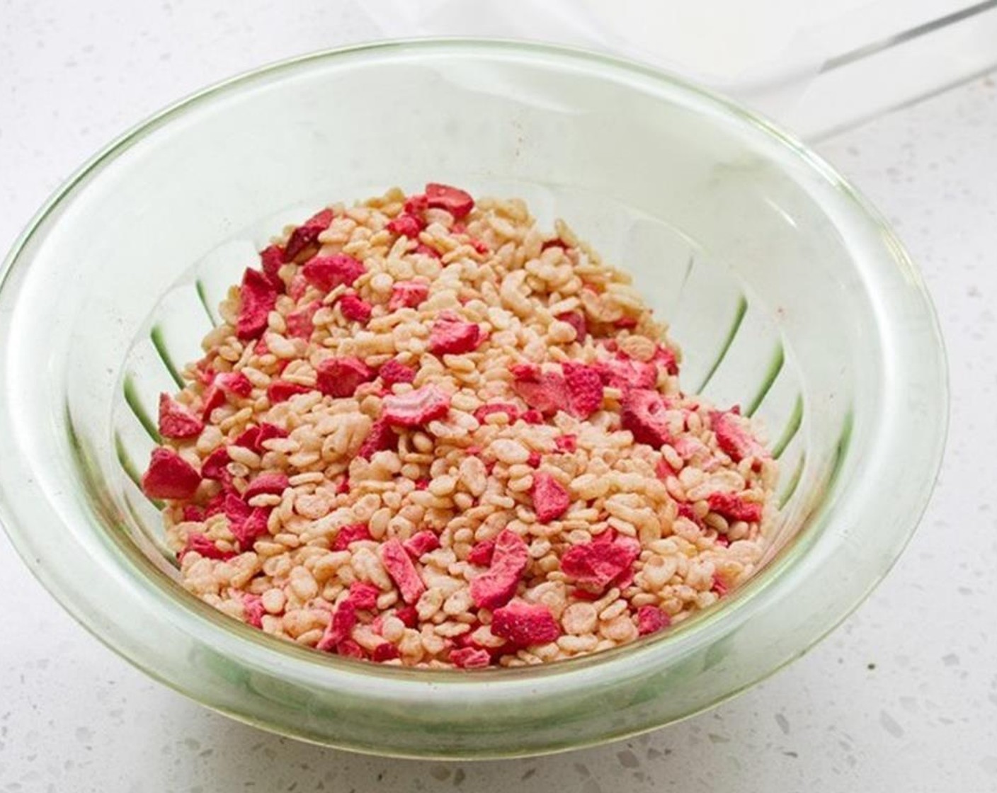 step 2 Spray a large bowl with Nonstick Cooking Spray (as needed) and add the Rice Krispies® Cereal (3 cups) and Freeze Dried Strawberries (1 cup).