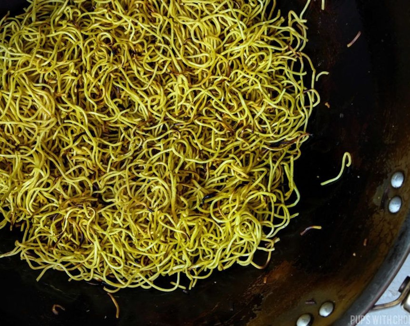 step 8 Add in the noodles and let it ‘pan fry’ untouched for 1 minute. After that, flip once every minute for around 5-8 minutes. Our goal is to get the noodles dried and crispy. If you are noticing that the noodles are burning, lower the heat a bit. A little burnt is okay.