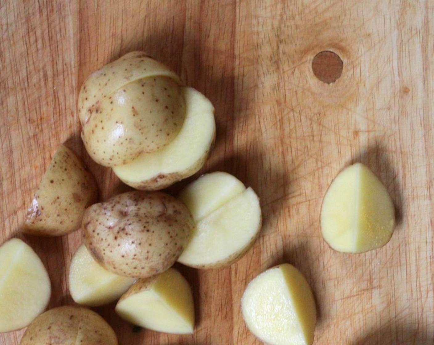 step 3 Cut the Potatoes (6) into quarters. Chop the Fresh Parsley (1/2 cup).