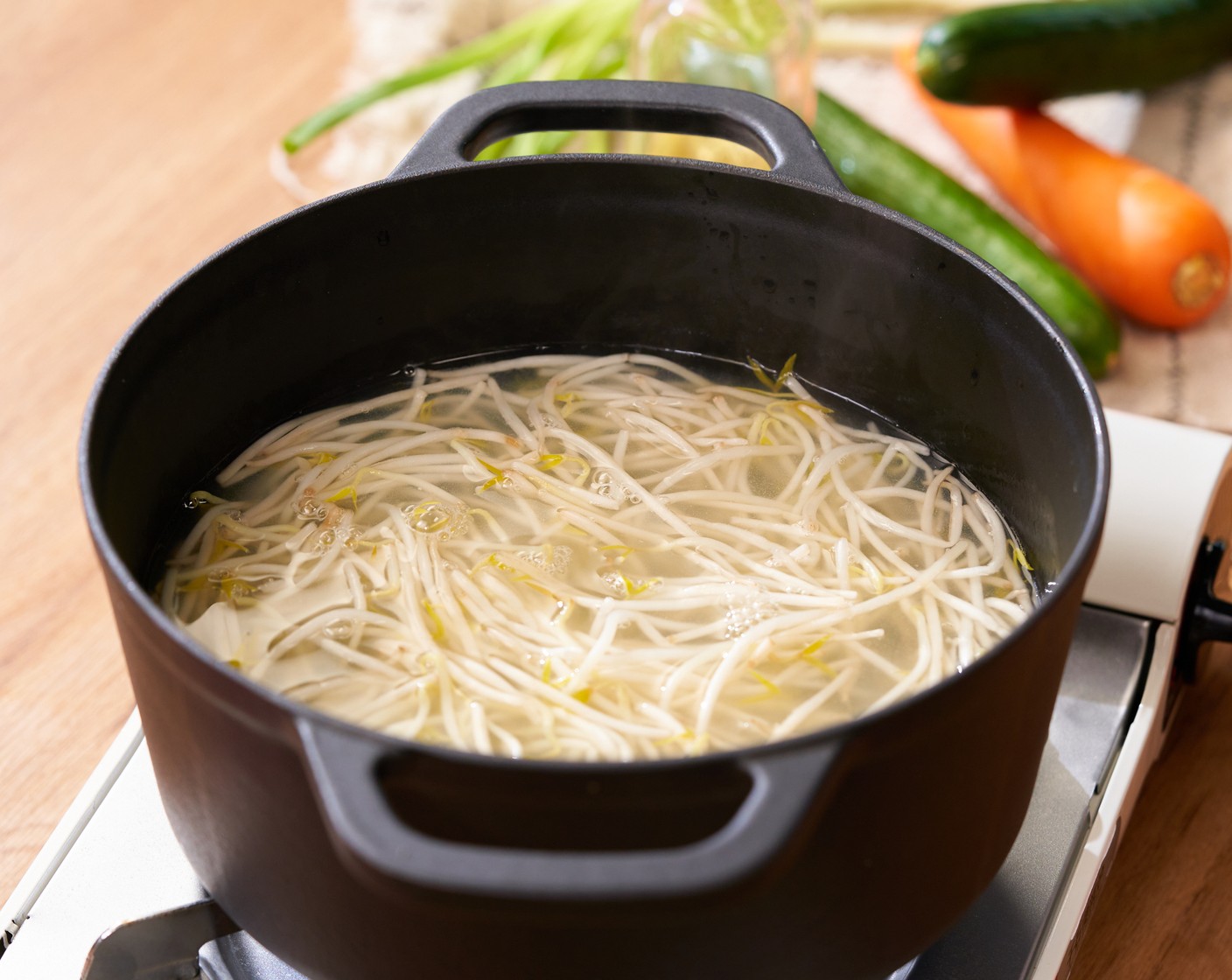 step 2 In the same pot with noodles and water over medium heat, blanch Bean Sprouts (1 can) for 1 minute, and transfer to a bowl to cool down.