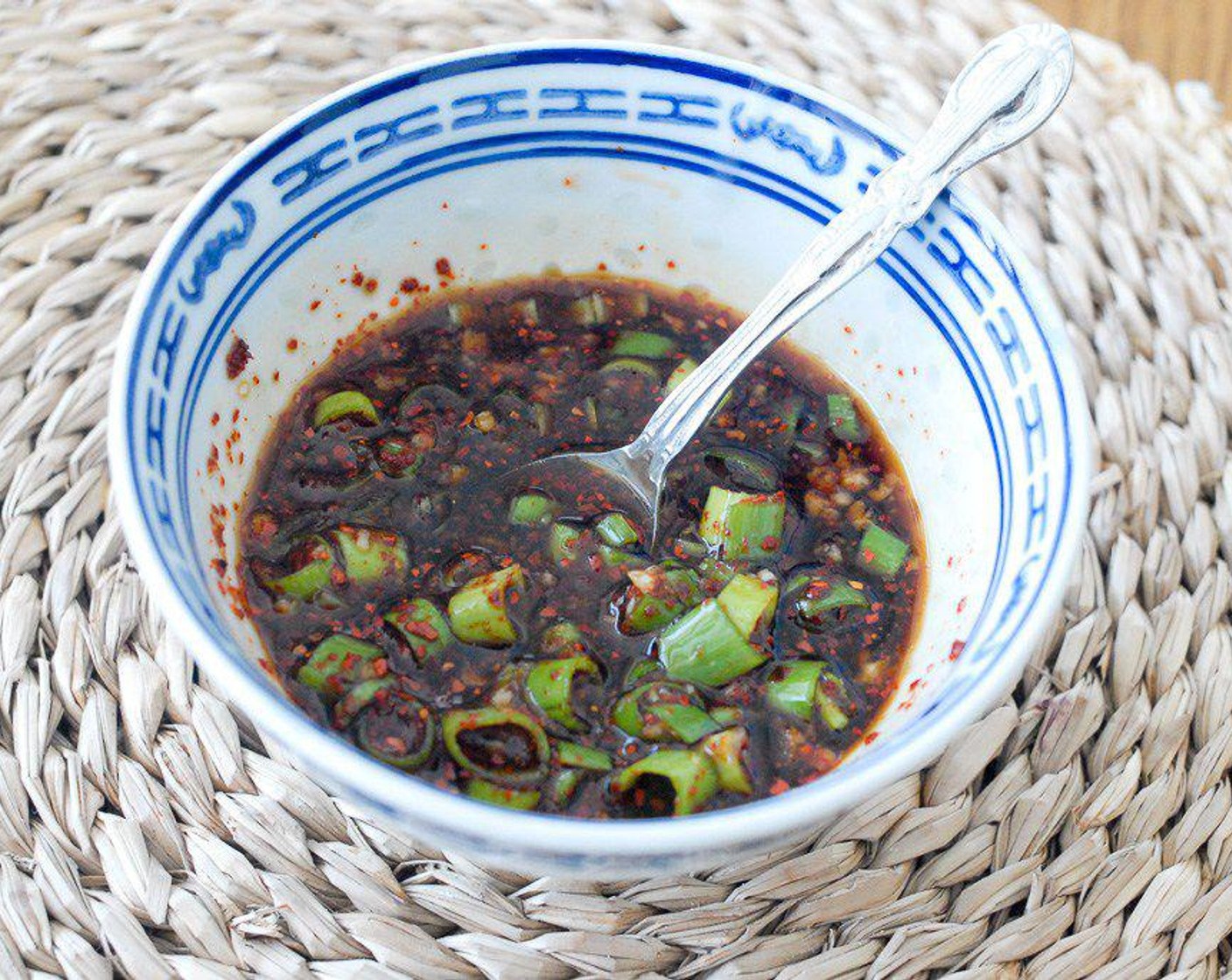 step 3 In a bowl, mix Soy Sauce (2 Tbsp), Garlic (1/2 Tbsp), Granulated Sugar (1 tsp), Sesame Oil (1 tsp), and Korean Chili Flakes (1 tsp) together.