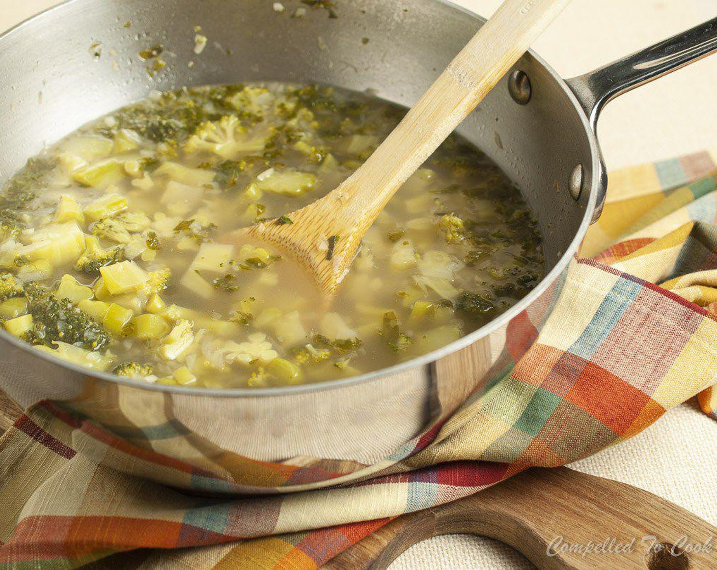 step 4 Add chopped broccoli, Chicken Broth (3 cups) and Fresh Oregano (1 Tbsp). Bring to a simmer, cover and cook until very tender, 15-20 minutes.