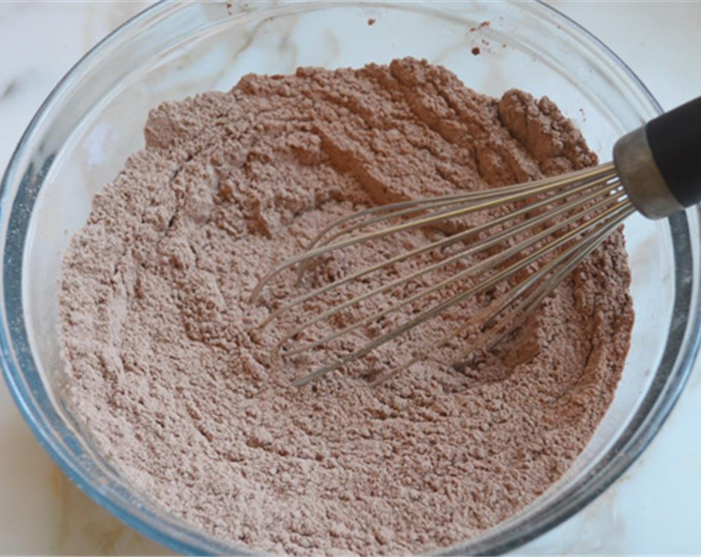 step 2 In a medium bowl, whisk together the All-Purpose Flour (1 3/4 cups), All-Purpose Flour (2 Tbsp), Unsweetened Cocoa Powder (1/4 cup), Unsweetened Cocoa Powder (2 Tbsp), Baking Soda (1 tsp) and Salt (3/4 tsp).