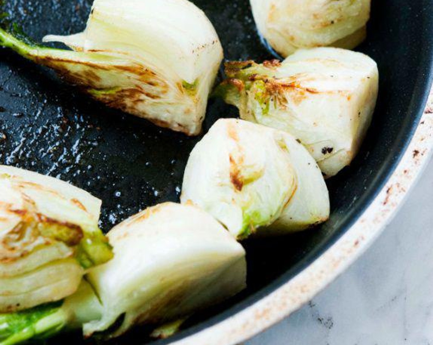 step 3 In a skillet melt Butter (2 Tbsp) add the fennel and cook on each side for about 5-6 minutes or until they get a nice golden color. Season with Salt (to taste) and Ground Black Pepper (to taste) and remove from the heat.