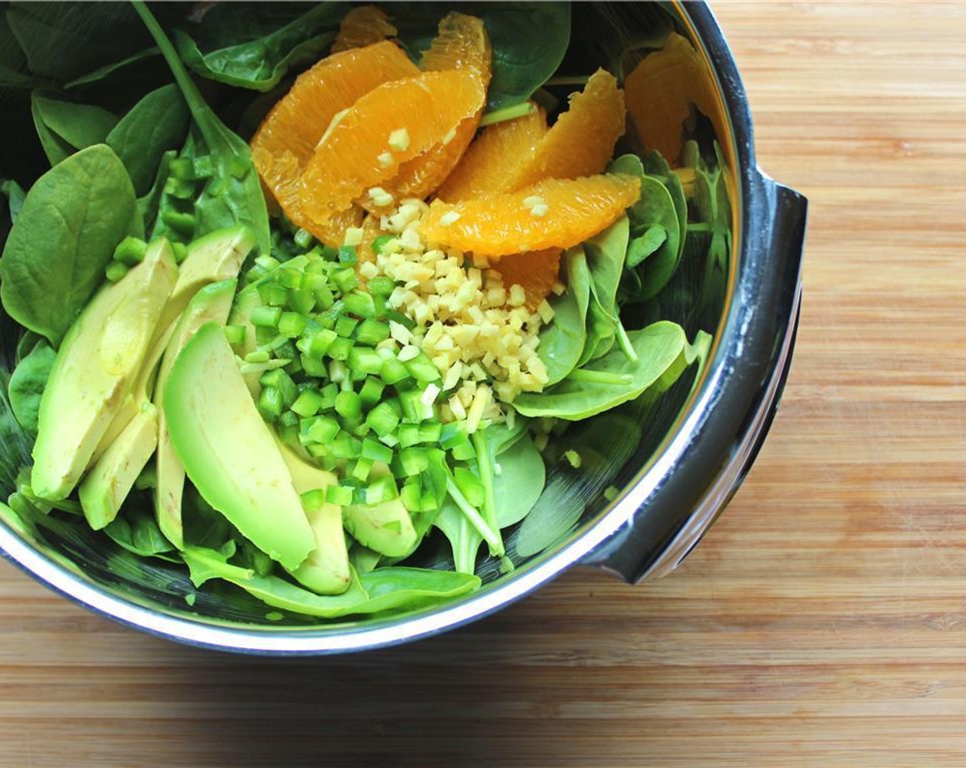 step 1 Peel and segment the Oranges (2). Peel and dice the Fresh Ginger (1 Tbsp). Seed and dice the Jalapeño Pepper (1). Slice the Avocado (1). Combine the orange segments, avocado, jalapeño, ginger and Fresh Spinach (4 cups) in a bowl.