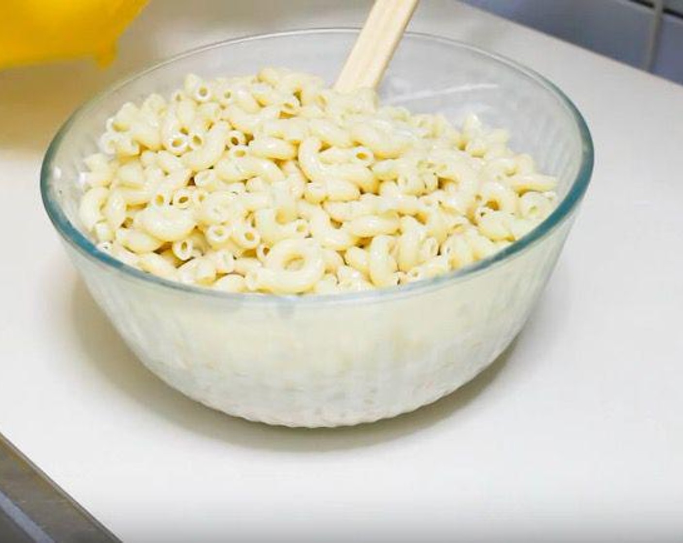 step 4 When the macaroni has cooled completely, combine it with the dressing.