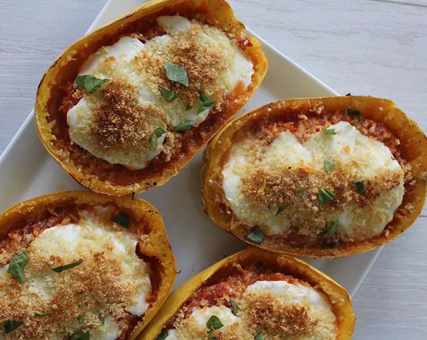 step 11 Sprinkle each squash with remaining basil and parmesan and serve hot!