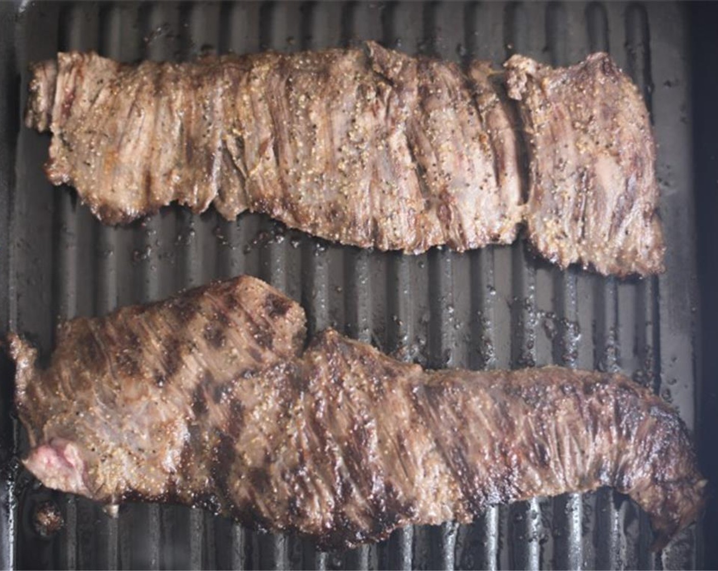 step 6 Remove the steak from the marinade and pat it dry with paper towels. Season generously on both sides with Salt (to taste) and Ground Black Pepper (to taste).Grill the steaks for 2-3 minute per side for medium rate.