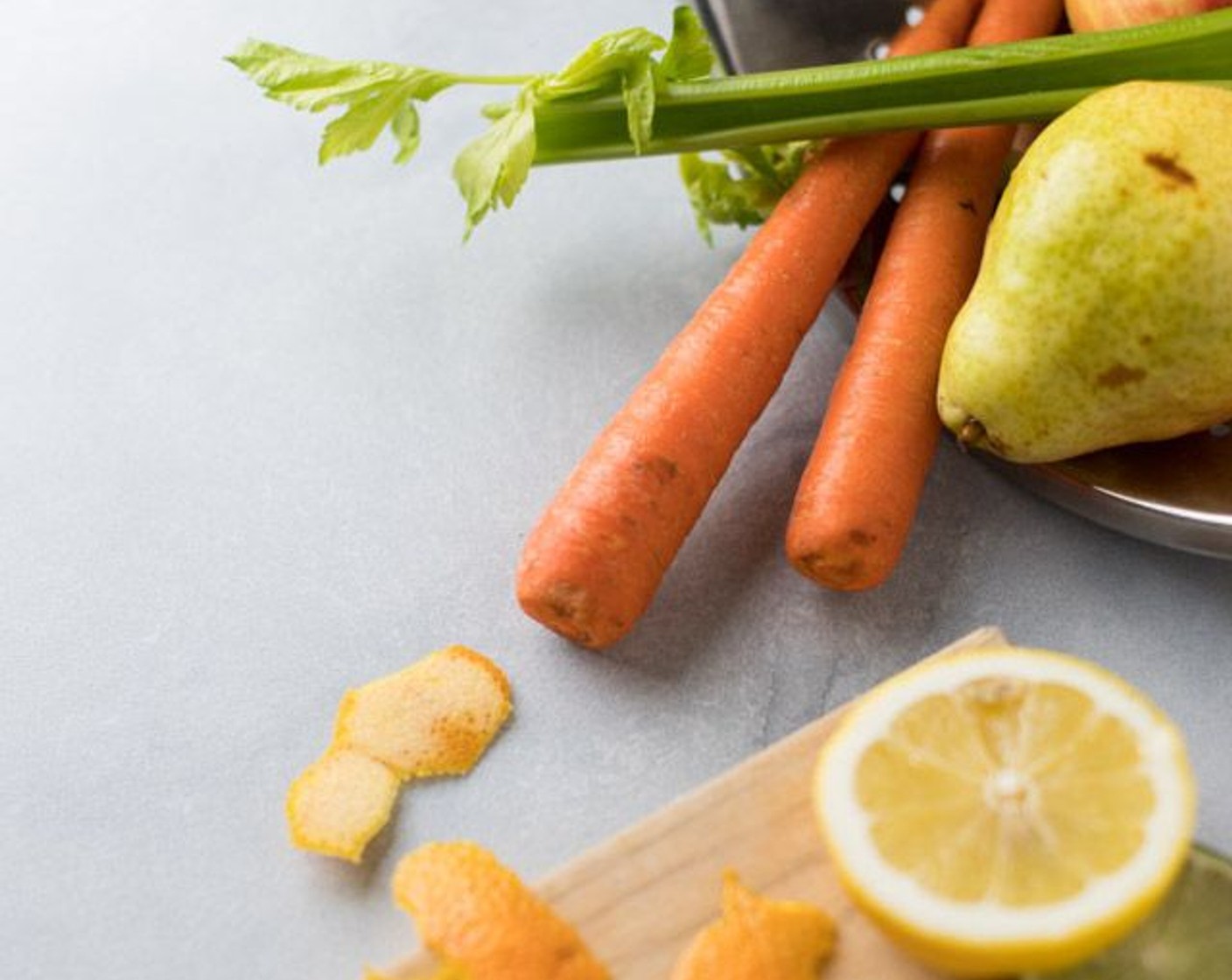 step 1 Rinse all the fruits and vegetables. Peel the Navel Orange (1) by shaving the outer orange peel, leaving the white flesh intact. Slice the large vegetables and fruits into smaller pieces to fit into your juicer well.