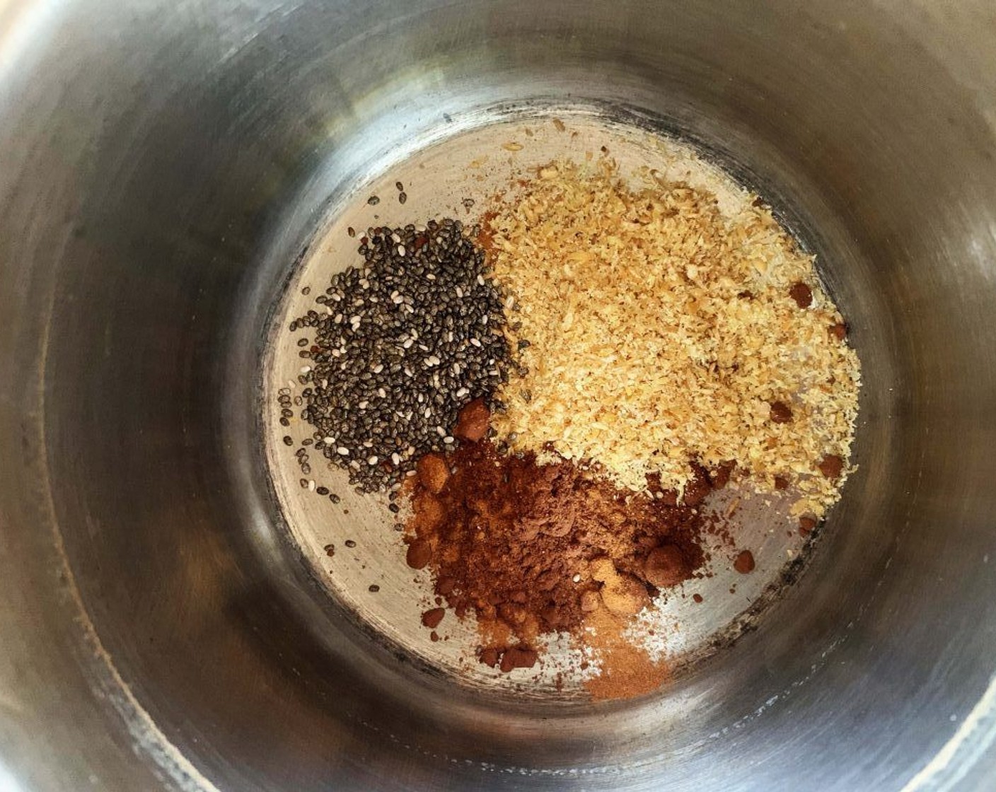 step 1 Place the Flaxseeds (1/2 Tbsp), Chia Seeds (1/2 tsp), Unsweetened Cocoa Powder (1 tsp), Ground Cinnamon (1 dash) and Stevia (1 packet) into a saucepan.