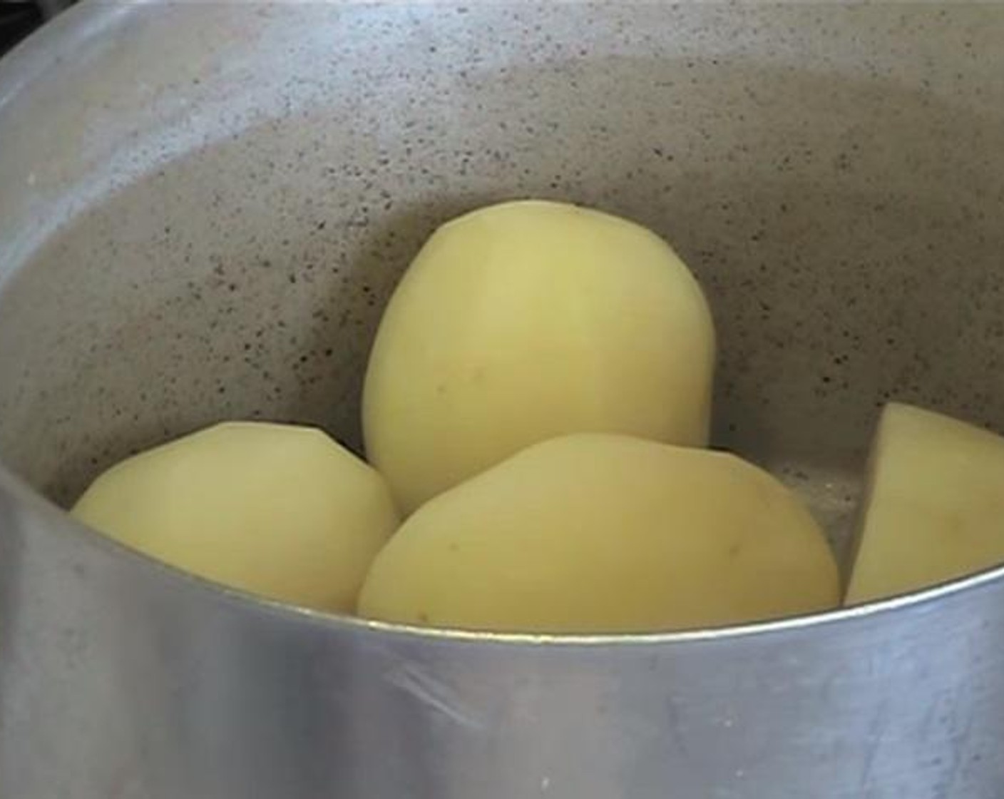 step 3 Inside a pot, boil your Potatoes (3.3 lb) until they are tender.
