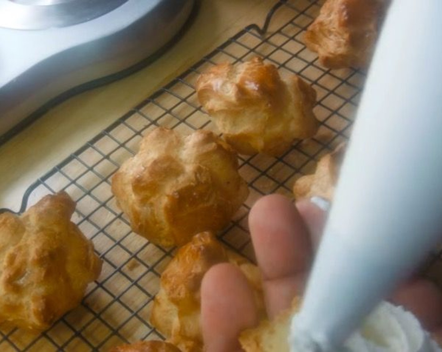 step 9 Cut each puff in half and fill with Whipped Cream (to taste). Replace the tops. They can also be filled with a savory filling if you don't want to use cream.