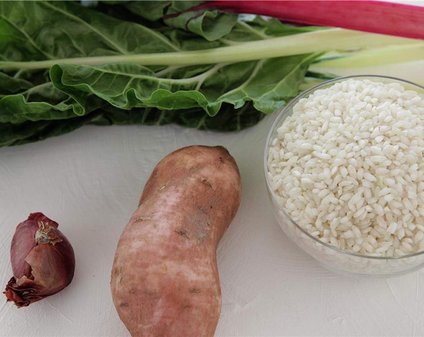 step 2 Peel and shred Sweet Potato (1); it should amount to about 3 cups. Remove the stems and roughly chop the Chard (4 cups). Finely chop the Shallot (1).