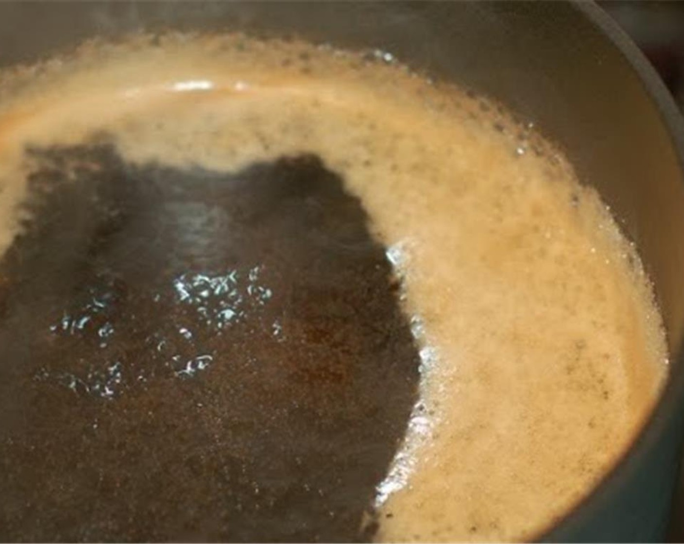 step 10 For frosting, place Guinness® Extra Stout Beer (1 cup) in a small saucepan and bring to a boil over medium heat. Boil for 15 minutes, until beer is reduced to about a 1/4 cup of liquid. Remove the pan from the heat.