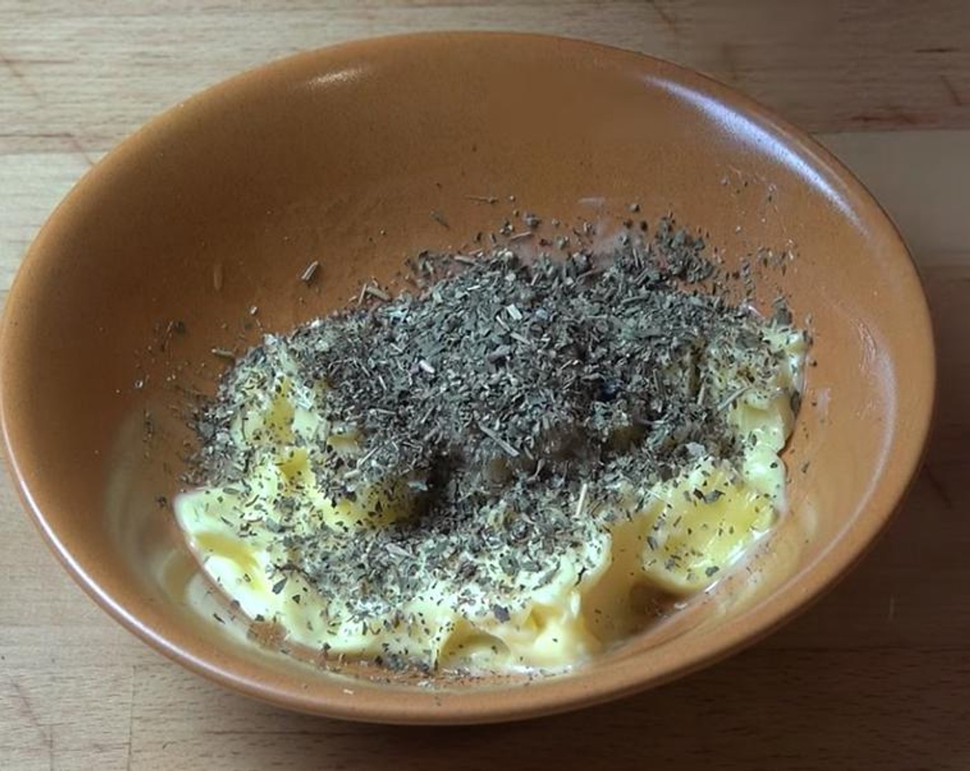 step 1 Mix Butter (4 Tbsp), Garlic (1 clove), and Dried Mixed Herbs (1 tsp) in a small bowl until well combined.