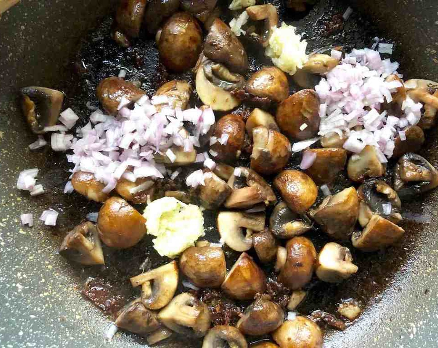 step 8 Add Shallots (2 Tbsp) and Garlic (2 tsp) to the pan, cook until softened for about 2-3 minutes.