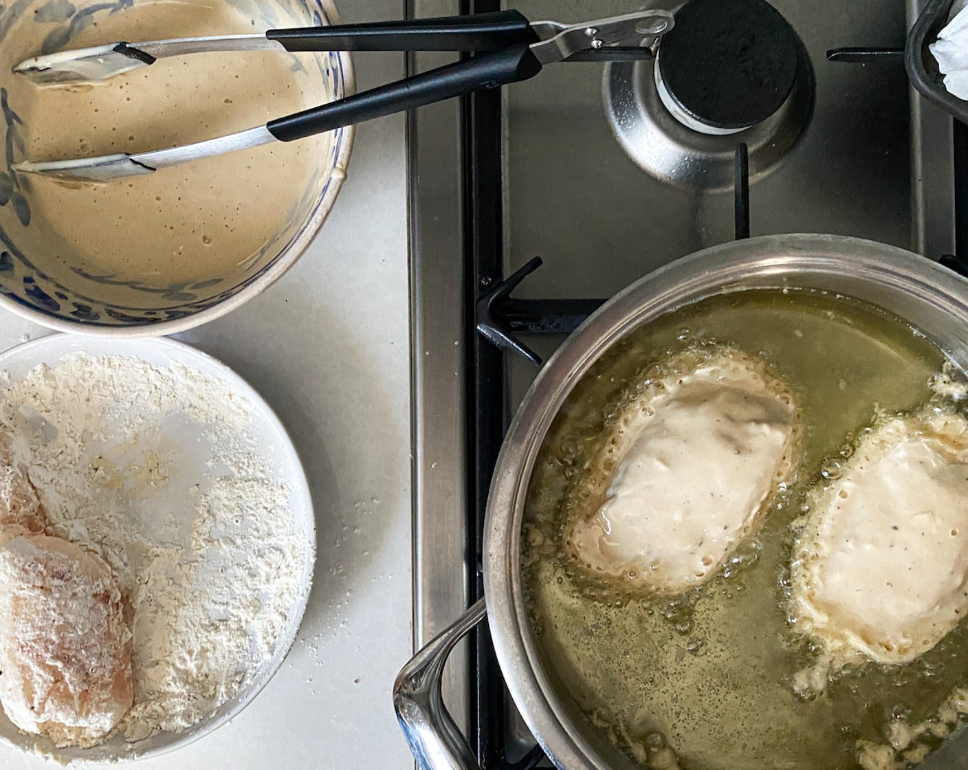 step 7 Fry fish until golden brown on both sides for about 8–10 minutes (depending on the thickness of the fish). When cut open, the flesh should be white and opaque and flake apart.