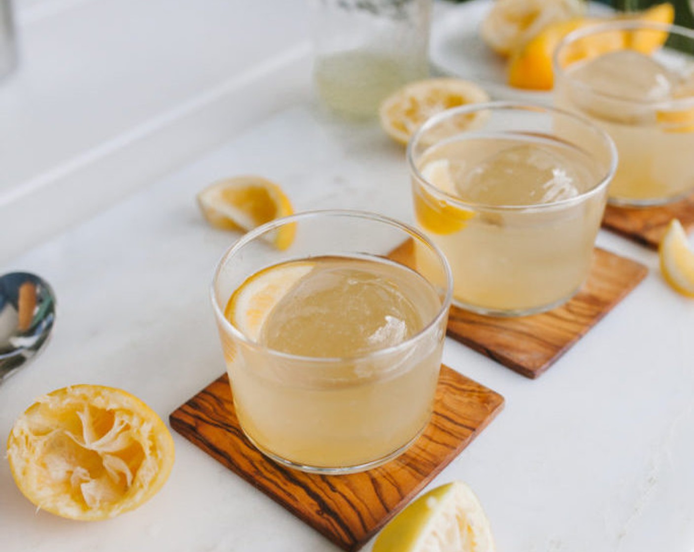 step 3 Strain into a glass with a large ice cube – I love using my sphere molds for this!