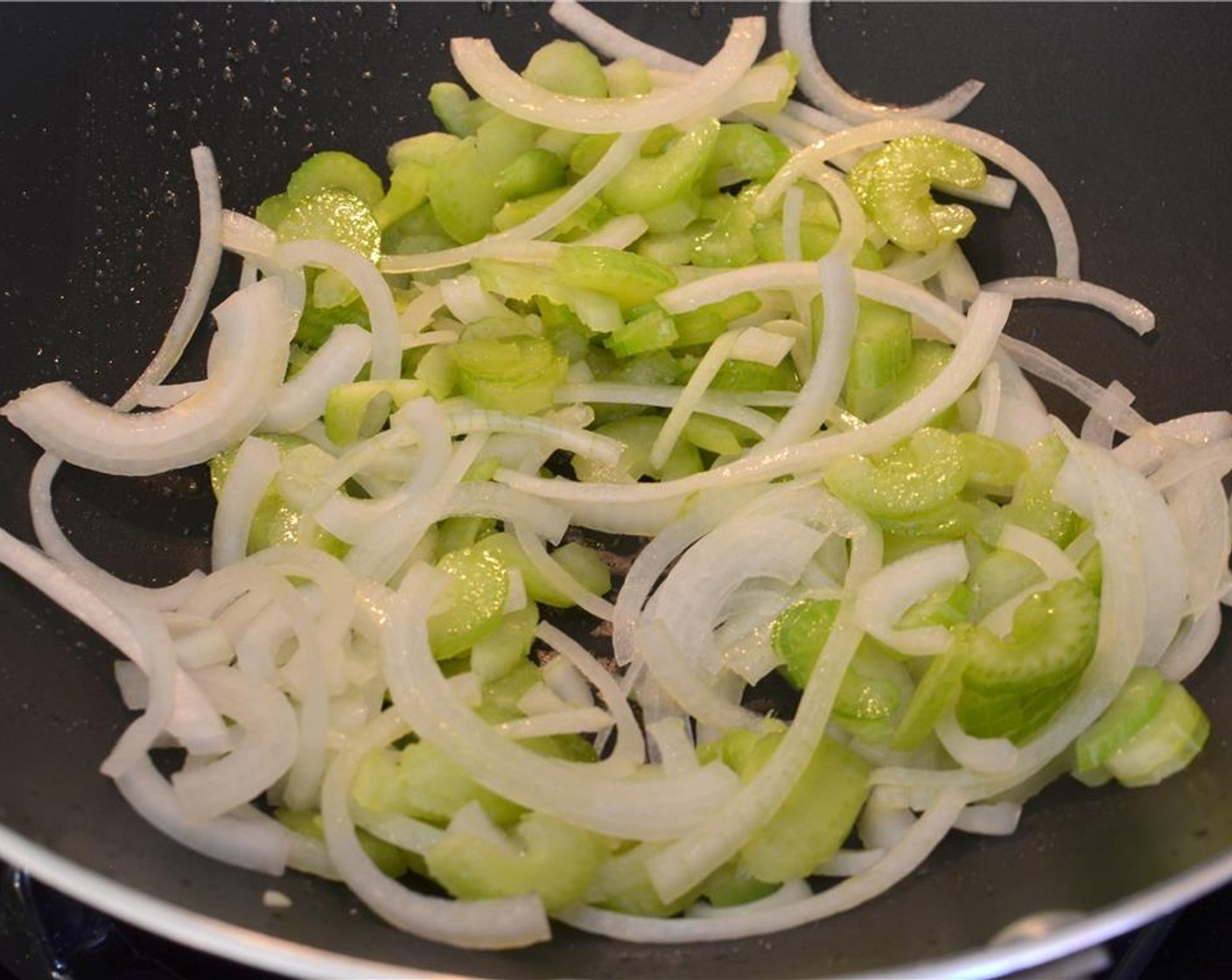 step 7 Add the onion and celery and toss or saute them on high heat for about 1-2 mins until slightly tender.