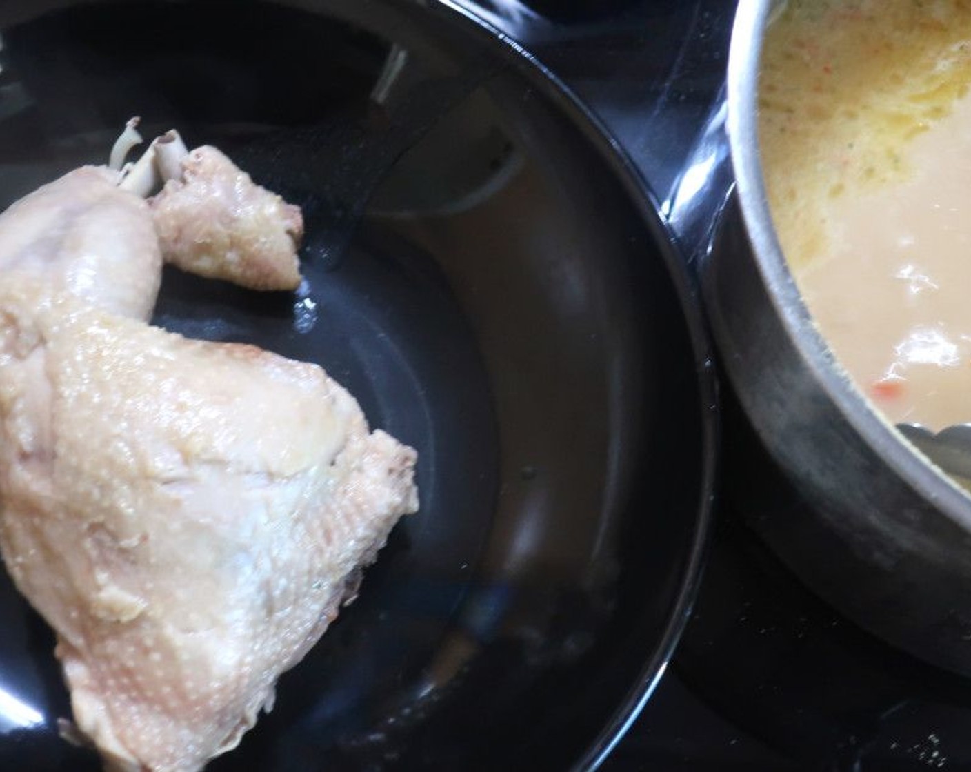 step 3 Simmer until the chicken is tender. Remove the chicken, let it cool enough to handle, then remove the meat from the bones, discard the bones. At this point, if you want the soup to be creamy and smooth, blend the soup with a blender to uncurl the coconut milk.
