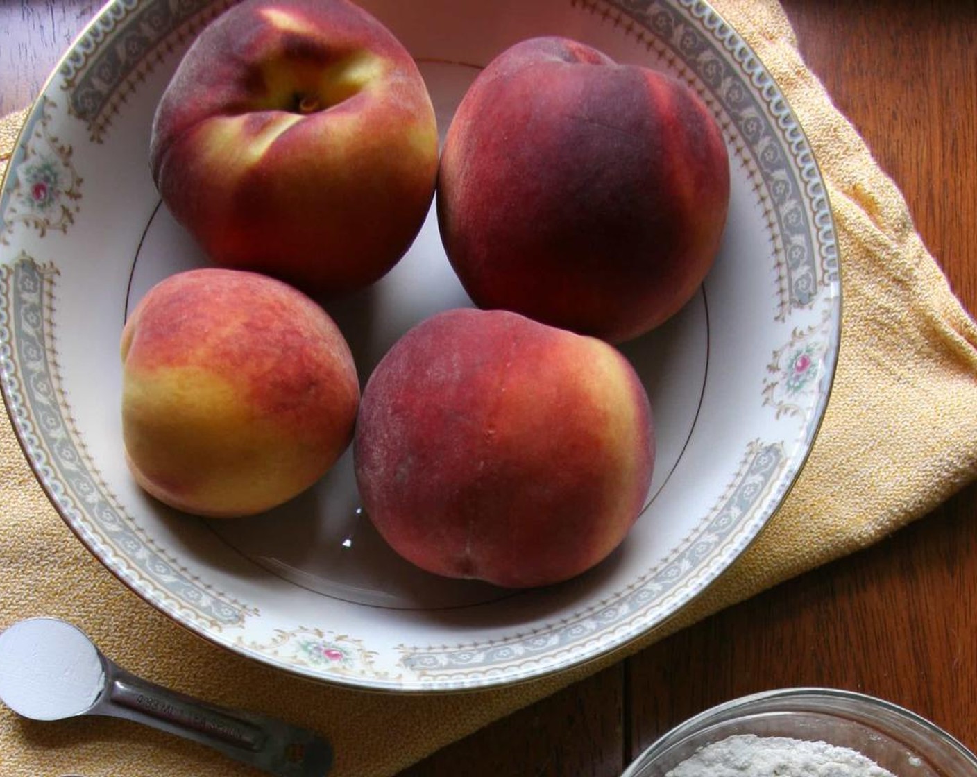 step 2 Peel and slice the Peaches (4). Place peaches in an 8×8 dish.