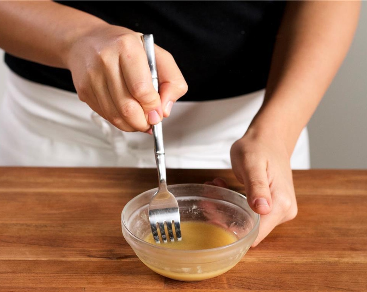 step 6 In a small bowl mix together Apple Cider Vinegar (2 Tbsp), Honey (1 Tbsp), Salt (1/2 tsp), Canola Oil (1 Tbsp), and Dijon Mustard (1 Tbsp). Add the vinaigrette to the cabbage mixture and toss to coat. Set aside.