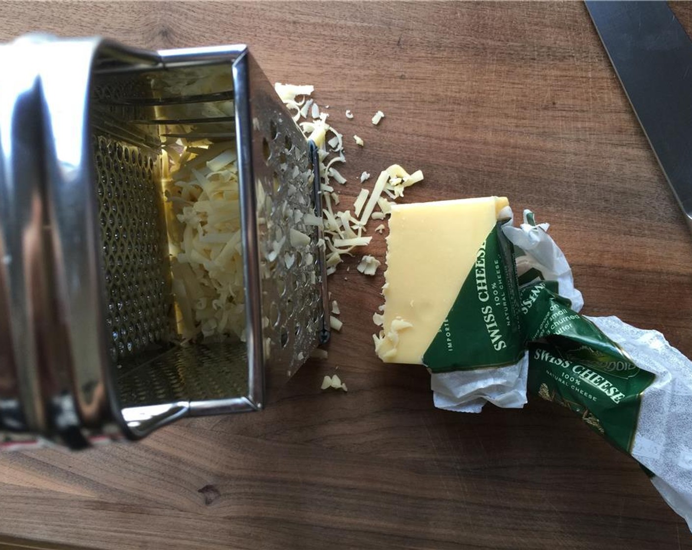 step 12 Shred the Swiss Cheese (1 cup).