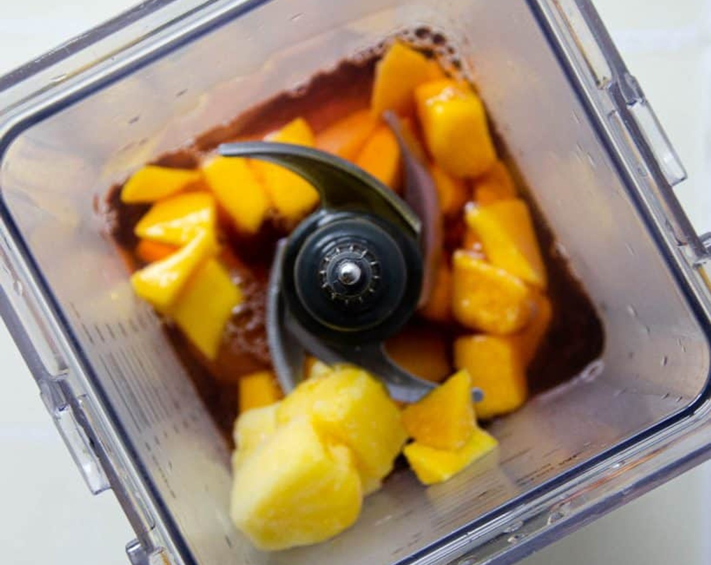 step 1 Blend the Frozen Pineapple (1 cup), Frozen Mangoes (1 cup), Agave Syrup (2 Tbsp), and Coconut Water (2 cups) in a blender until smooth. About 30-60 seconds.