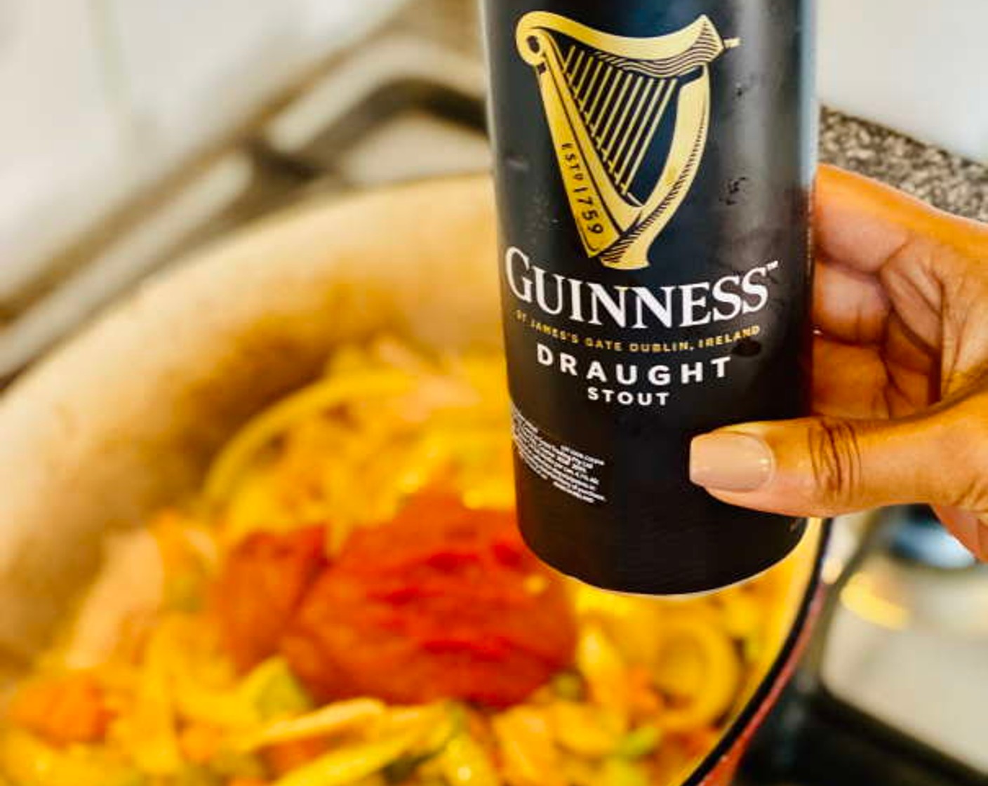 step 8 Add in the Tomato Paste (2 Tbsp) followed by the pint of Guinness® Stout Beer (1 3/4 cups) and give the pot a good mix. Return the lamb chops to the pot and cover them with the veggies and liquid as best you can to ensure the flavors penetrate as it cooks.
