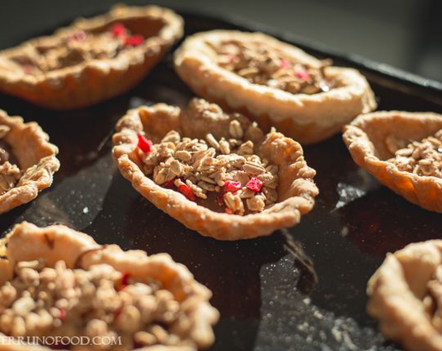 step 8 Once the coconut cream has cooled down we can start to assemble the tarts by putting a layer of Nutella® (1/2 cup), a layer of Granola (1/3 cup), then topped with the coconut cream.