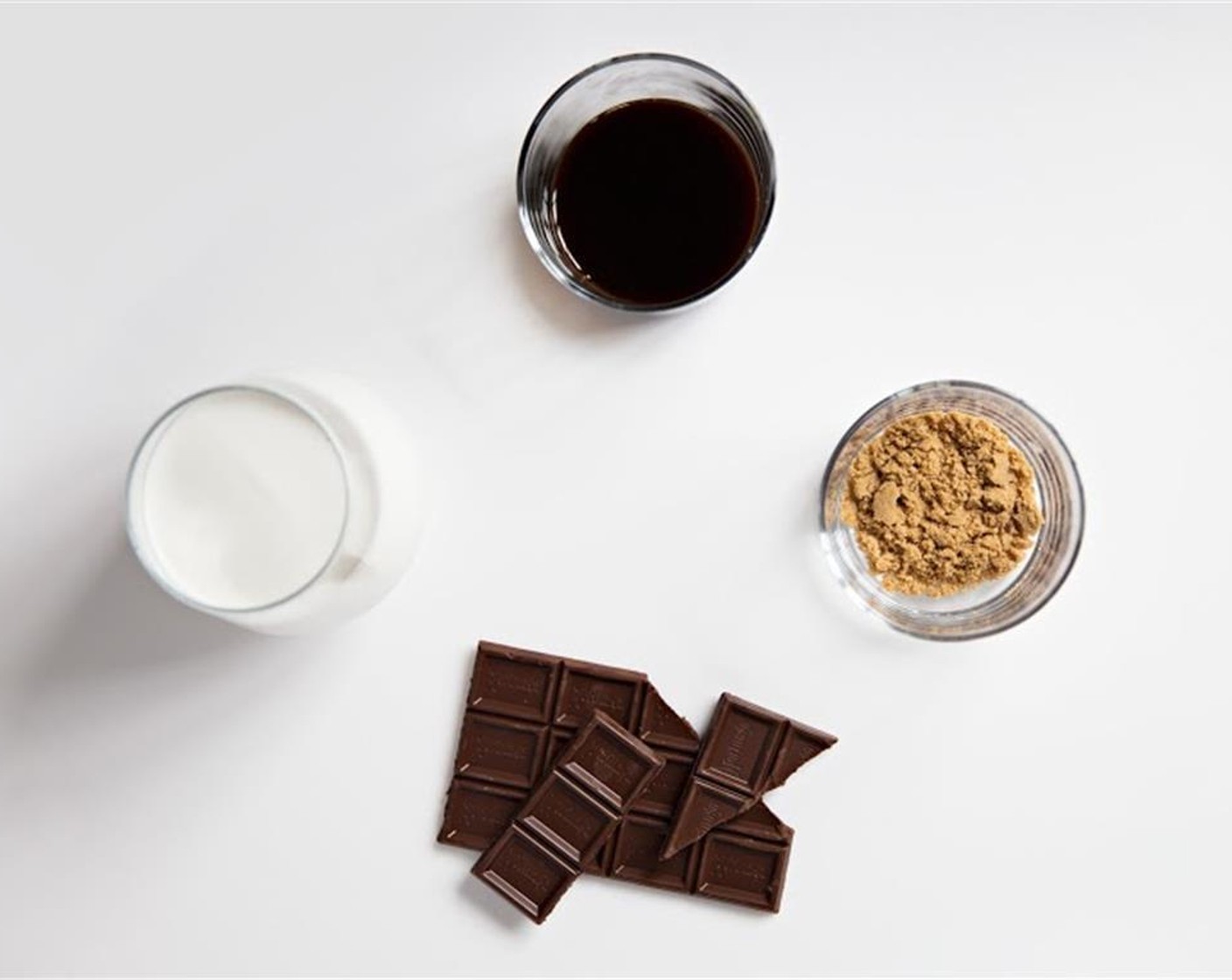 step 1 In a small mixing bowl, combine Brown Sugar (2 tsp), Dark Cocoa Powder (1 tsp), and the Espresso (3 fl oz) while it is still hot. Then let cool.