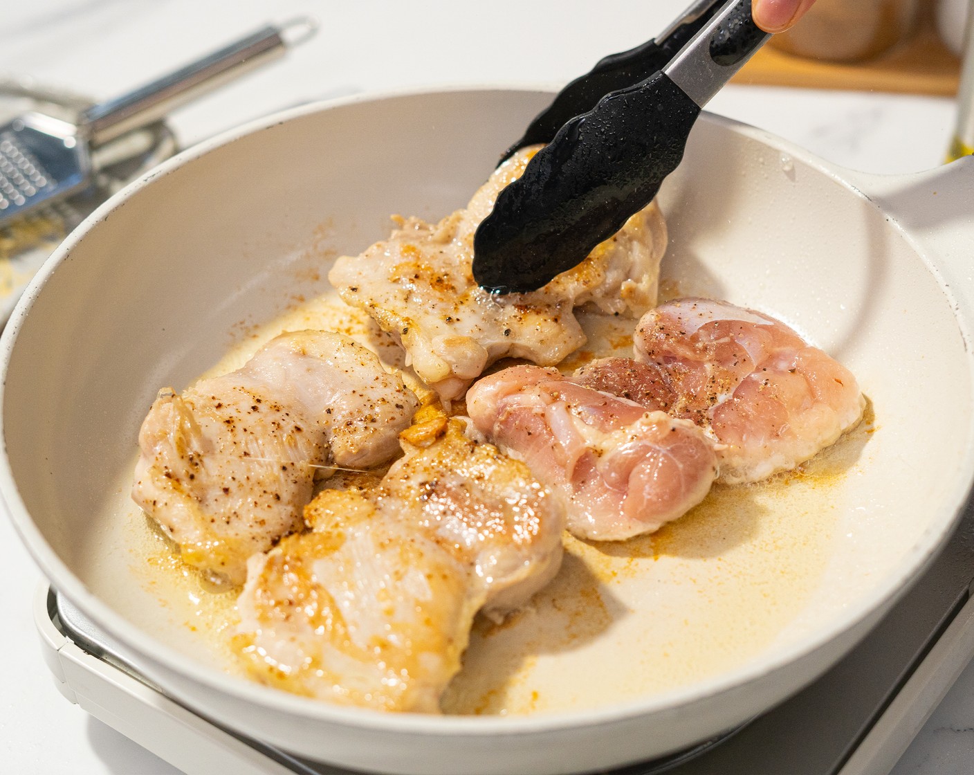 step 7 Once add in all the stock. Heat Olive Oil (1 1/2 Tbsp) in a frying pan over medium-high heat, sear the chicken until golden brown and cook through. Remove from the pan and let rest for 5 minutes.