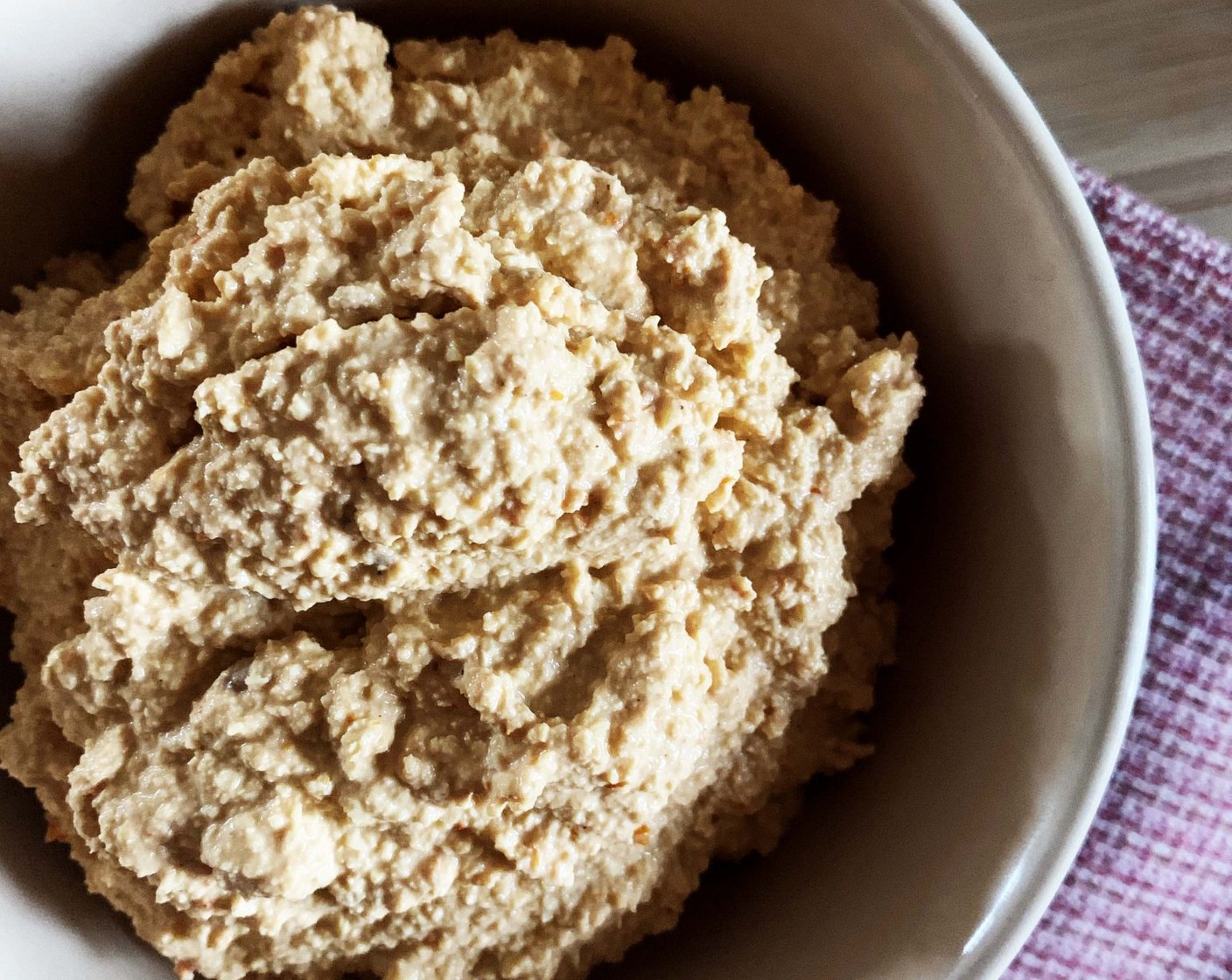 step 4 Transfer your hummus into a serving bowl and enjoy with crackers or sticks of fresh veggies.