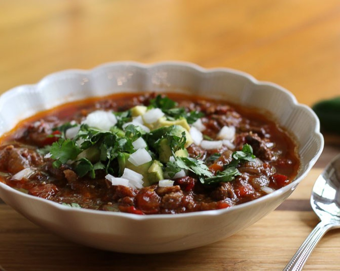 step 5 Serve in bowls, garnished with Fresh Cilantro (to taste), more onion, and Avocados (to taste).