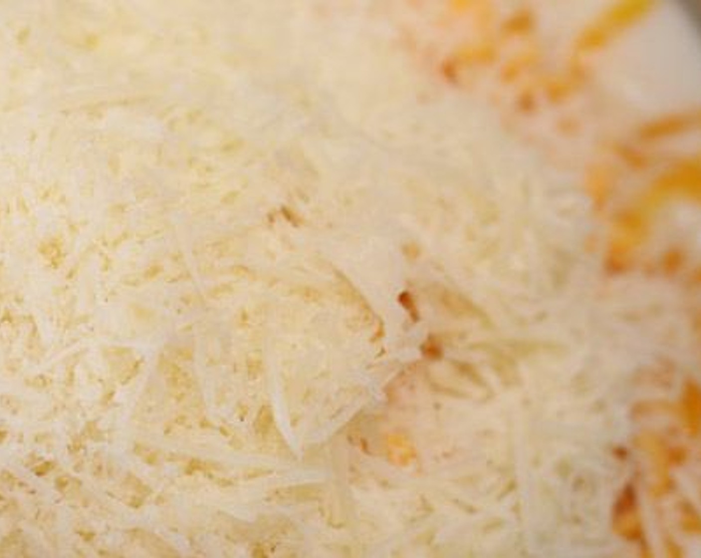 step 4 Remove from the stove and stir in the Shredded Sharp Cheddar Cheese (2 cups), Monterey Jack Cheese (1 cup), and Sour Cream (1 cup), stir until melted and blended. Add the Frozen Shredded Hash Browns (1 bag) and stir until evenly mixed.