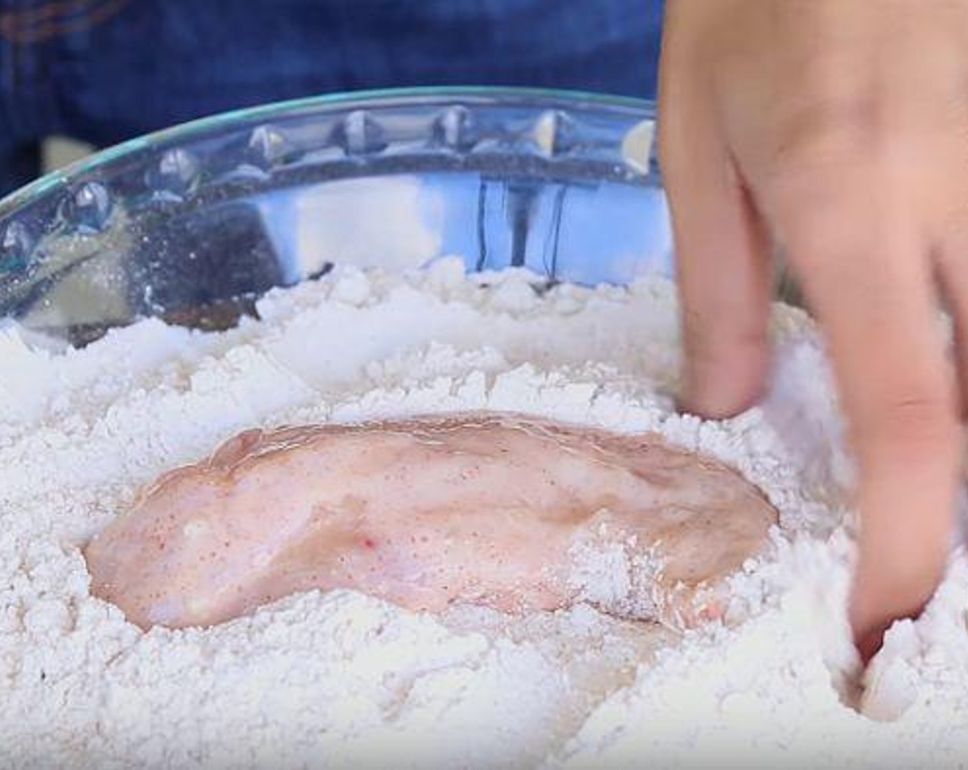 step 3 Line a baking sheet with aluminum foil. Remove the chicken tenders from the fridge. Add oil to a pan with high sides. Heat on high until oil is shimmering. Toss chicken tenders into the flour mixture. Be sure to press the chicken firmly into the breading. Place breaded tenders on prepared baking sheet.