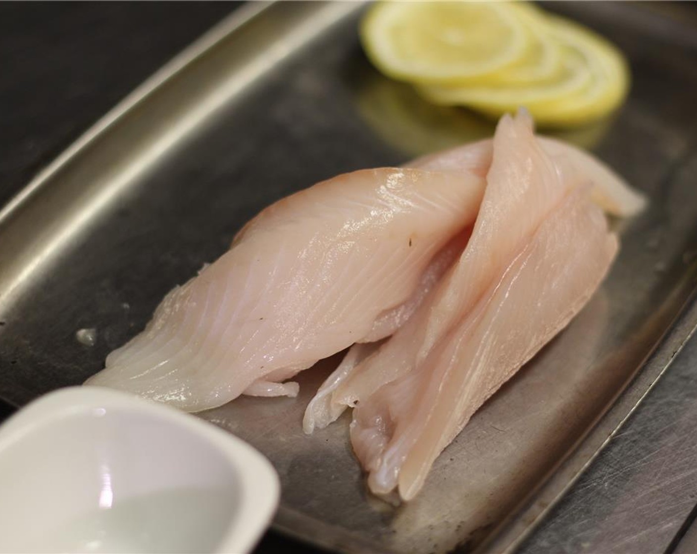 step 7 Slice the Lemon Sole (7 oz) into manageable portions.