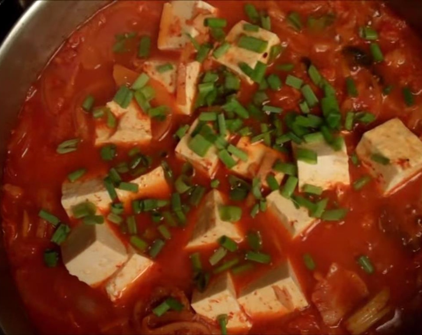 step 8 Just before serving, sprinkle with lots of thinly sliced green parts of the Scallions (to taste) and serve!