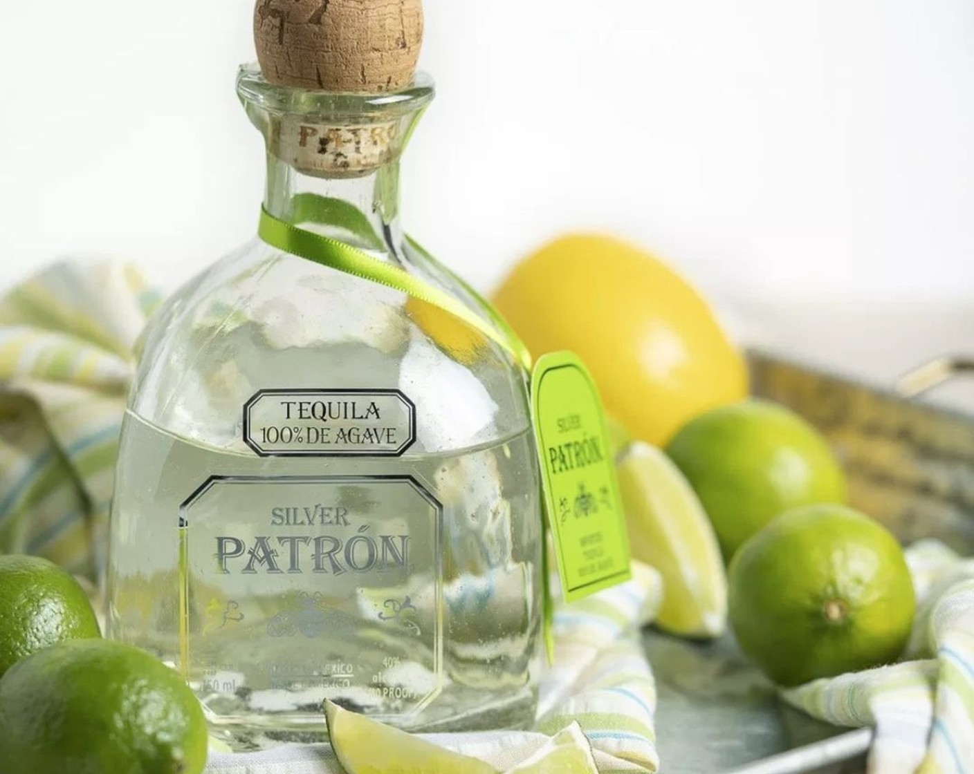 step 2 Strain chilled syrup into a medium size pitcher and stir in 1/2 cup Lime Juice, juice from Lemons (1 1/4), PATRÓN® Silver Tequila (7.5 fl oz), and Triple Sec (3.5 fl oz).
