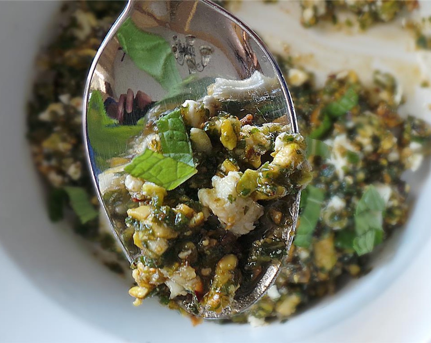 step 5 For the pesto, combine the Fresh Mint Leaves (1 cup), Pistachios (1/4 cup), and Olive Oil (1/4 cup) in a food processor and pulse. Adjust olive oil as needed. Season with Salt (to taste). Fold in Feta Cheese (to taste).