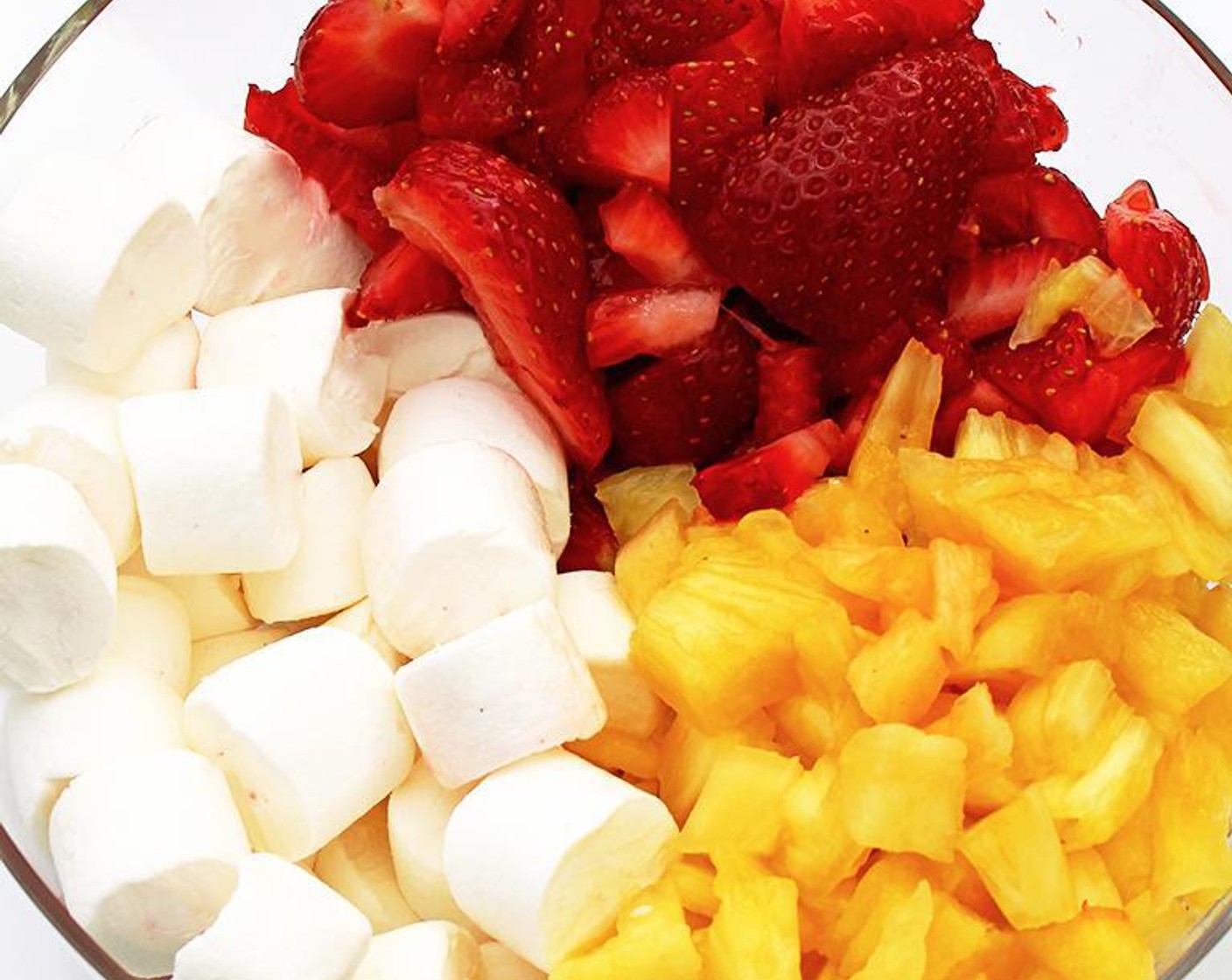 step 1 Finely chop and squeeze the Pineapple (3/4 cup). Combine Fresh Strawberry (1 cup), drained pineapple and Granulated Sugar (1/2 cup), and let stand in fridge for about 30 minutes.