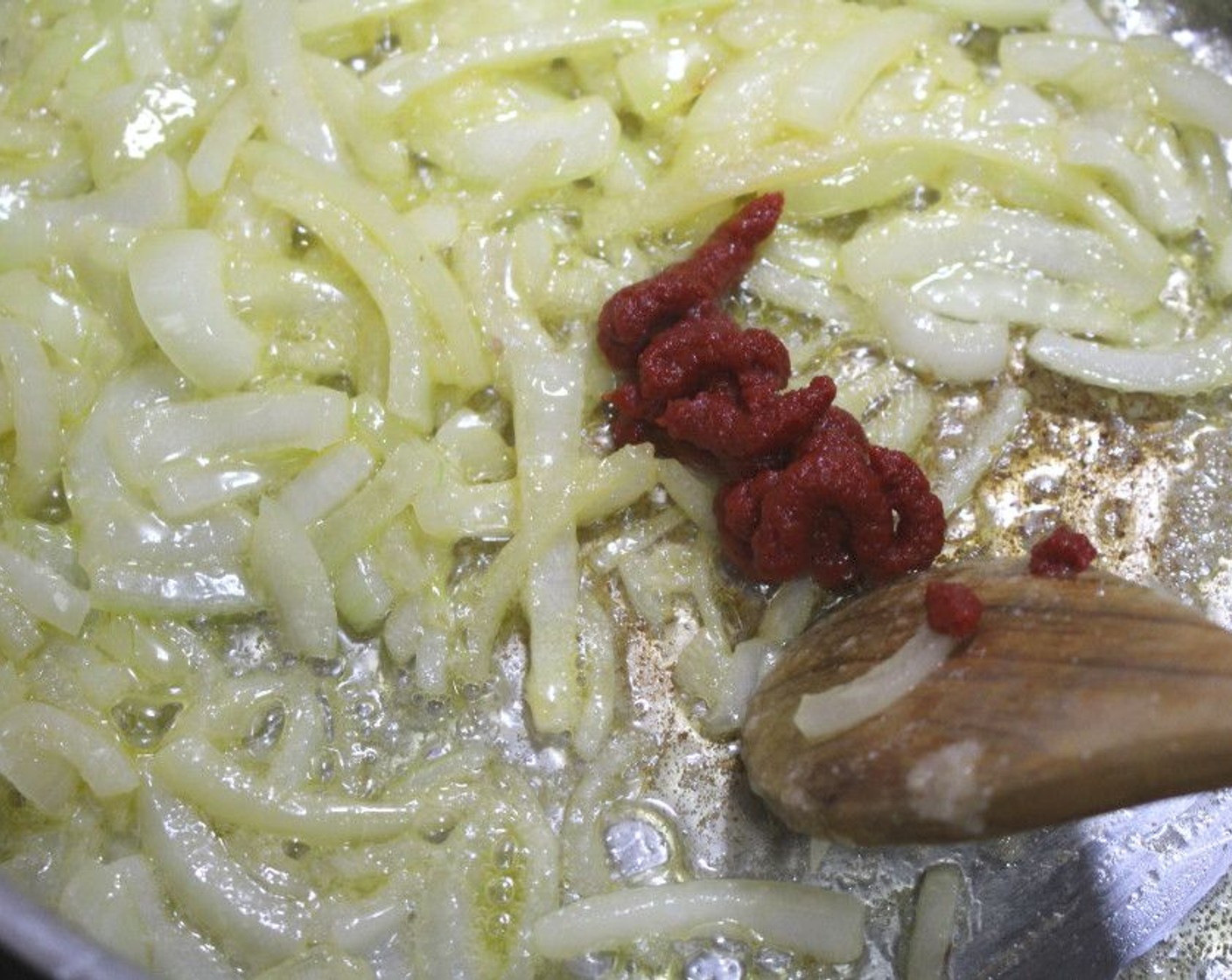 step 3 Add Tomato Paste (2 Tbsp), sauté another minute.