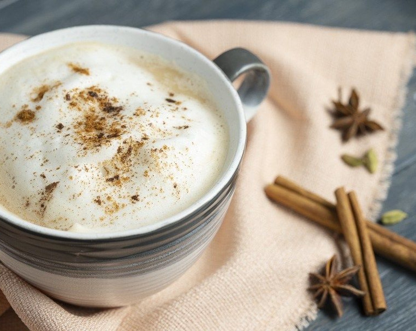 step 6 Warm and froth Unsweetened Almond Milk (2 cups). Pour 1/2 cup hot chai concentrate into a mug and top with 1/2 cup of almond milk and a spoonful or two of froth. Sprinkle with ground cinnamon if desired and serve immediately. Enjoy!