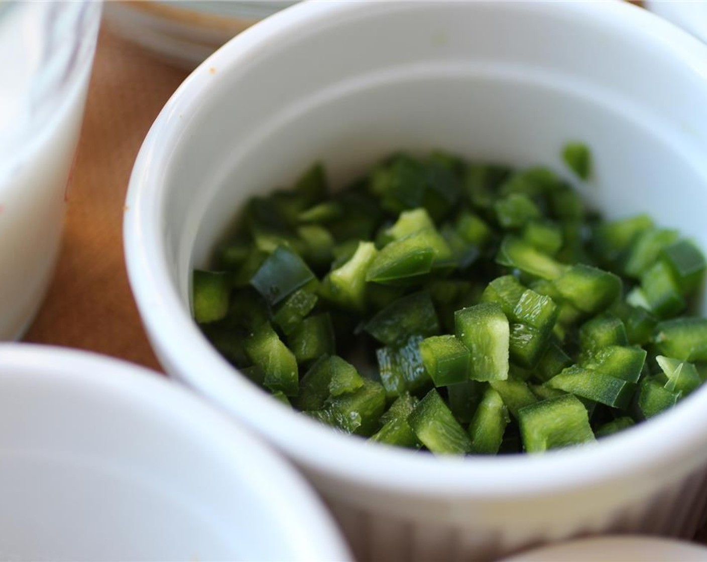 step 1 Preheat the oven to 375 degrees F (190 degrees C). Deseed and chop the Jalapeño Pepper (1).