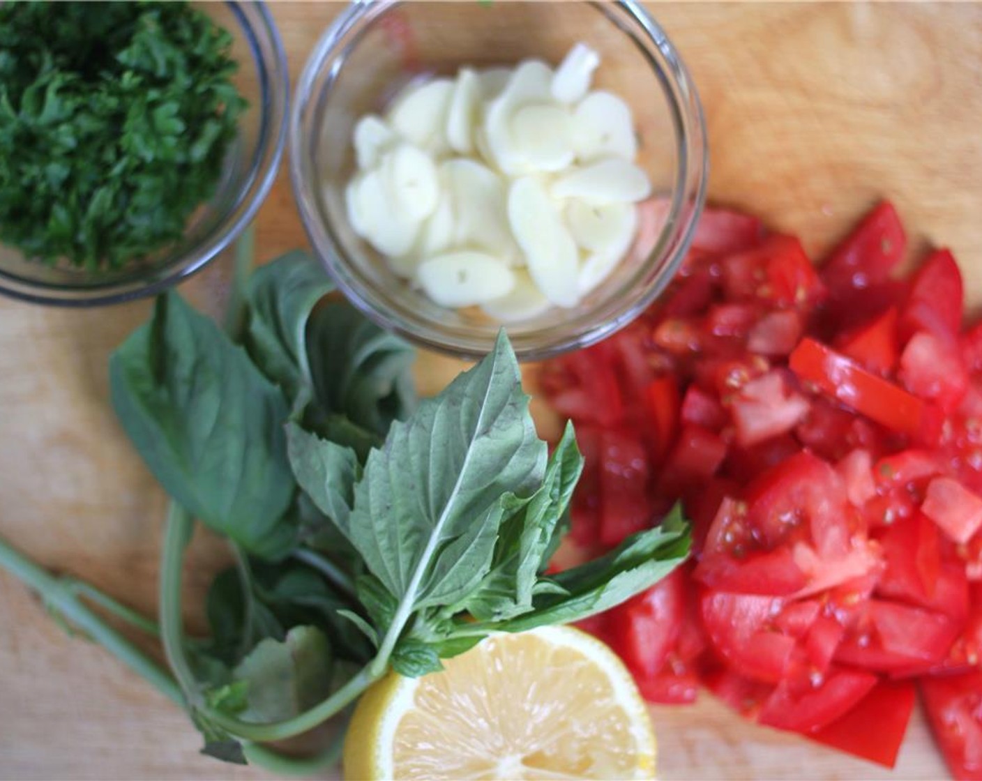 step 3 Dice the Roma Tomatoes (2). Chop the Fresh Parsley (2 Tbsp) and Fresh Basil (2 Tbsp).