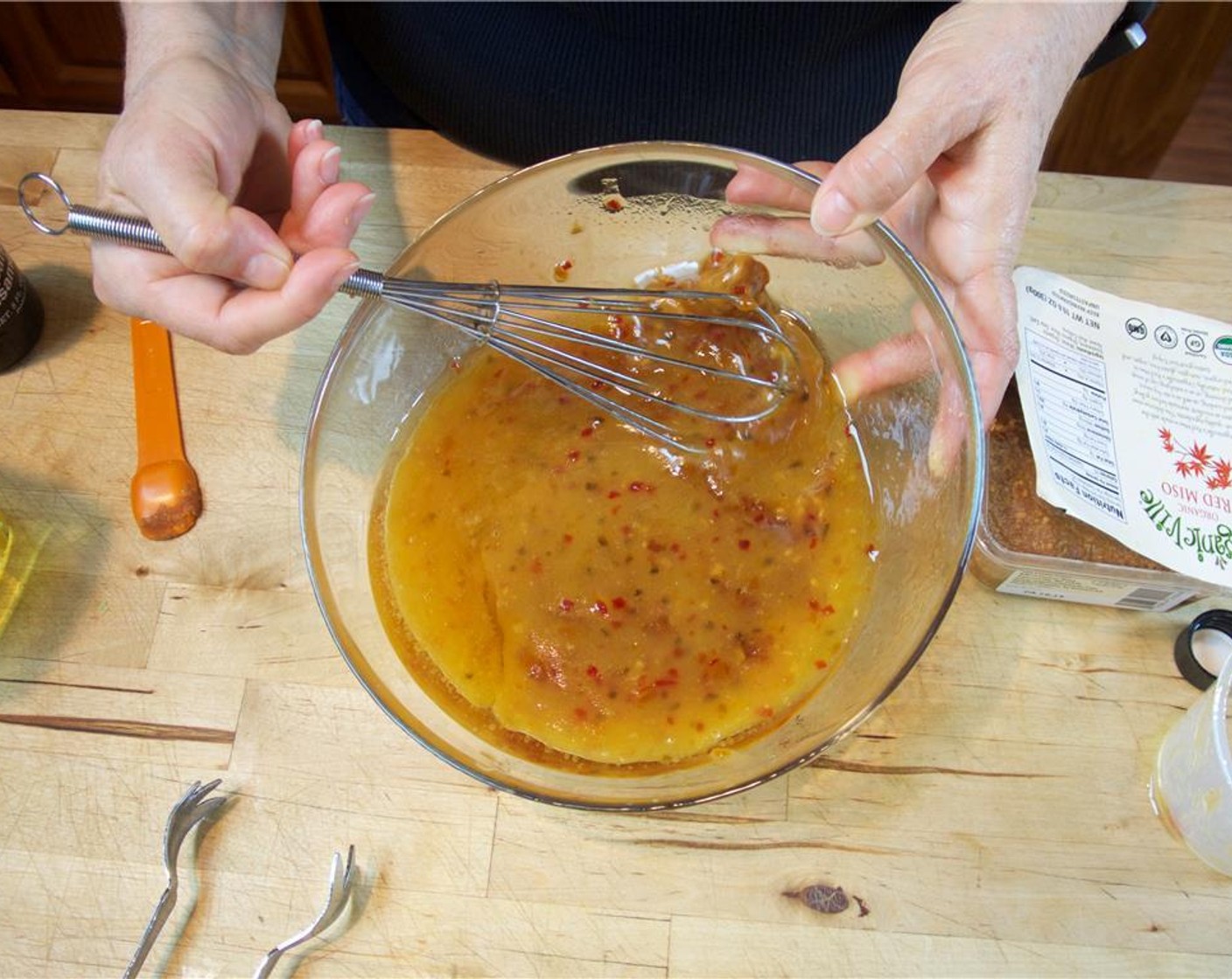 step 5 Whisk together the Rice Vinegar (3 fl oz), Just Jan's® Apricot Pepper Savory Spread (1/2 cup), Vegetable Oil (1/2 cup), Scallions (2), Red Miso Paste (1 tsp), Crushed Red Pepper Flakes (1 tsp) and Serrano Chili (1).