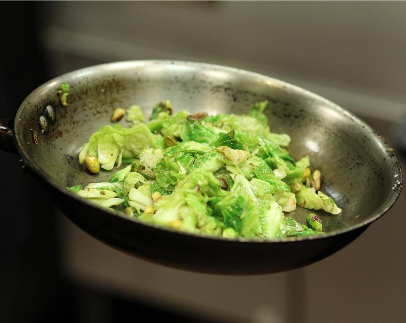 step 4 Add the Unsalted Butter (1 1/2 Tbsp) and melt to coat the brussels sprouts. Squeeze the Lemon (1/2) and toss the lemon juice with the brussels sprouts.