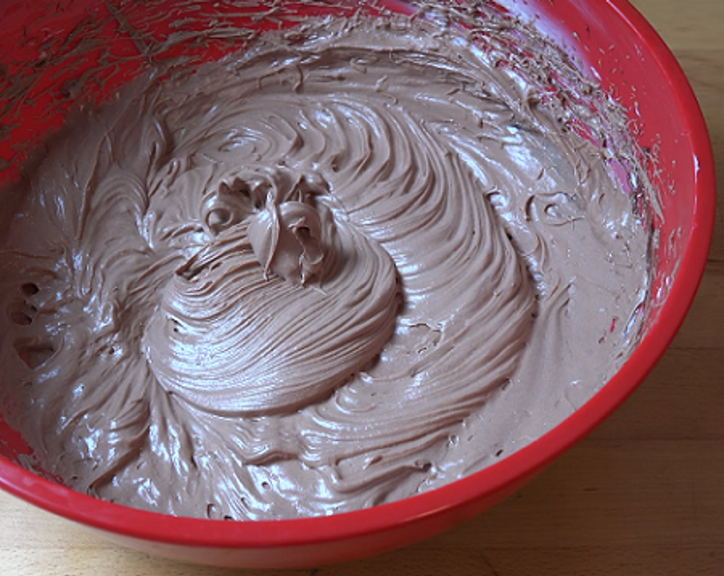 step 4 In a large mixing bowl, add Philadelphia Original Soft Cheese (2 cups) and La Lechera® Sweetened Condensed Milk (1 1/3 cups). Using an electric hand mixer, beat together. Pour in the melted chocolate and beat again.
