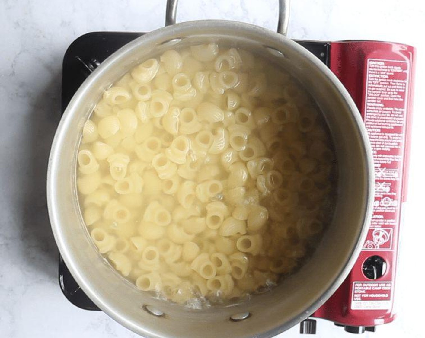 step 1 Bring a large pot of well-salted water to a boil. Cook Pasta (12 oz) until 1 minute shy of al dente, according to the package directions. Drain, reserving 1/2 cup (or more) of pasta water.